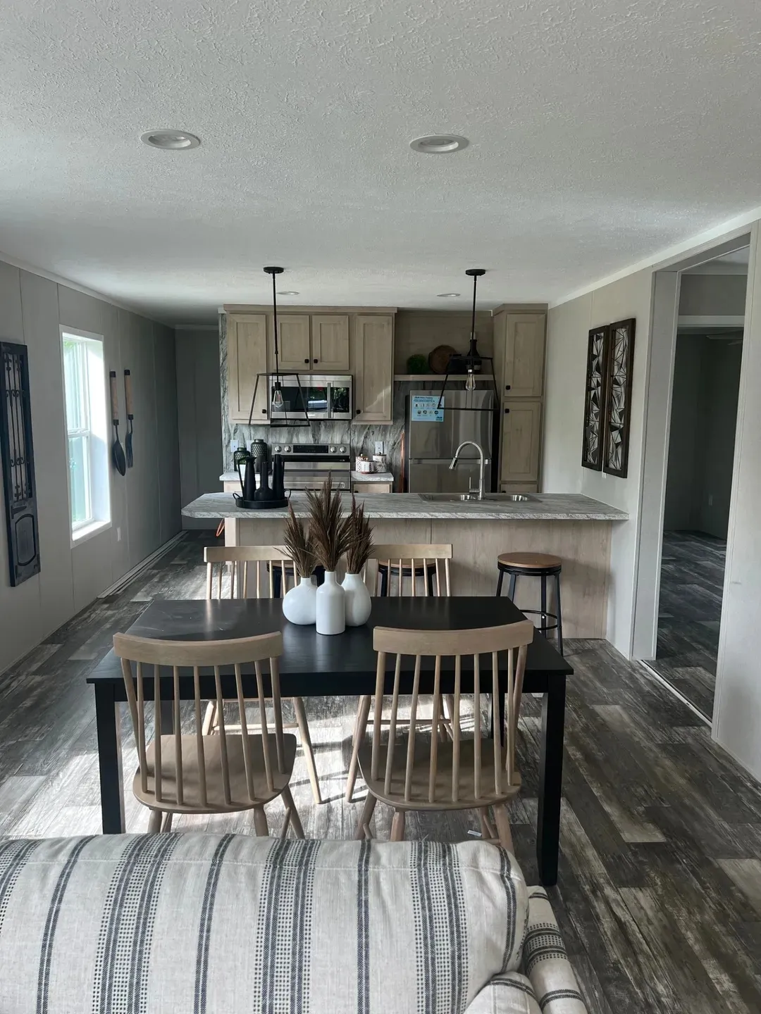 The JADE Living Room. This Manufactured Mobile Home features 2 bedrooms and 1 bath.