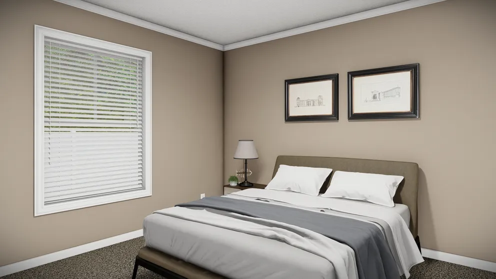 The THE MAVERICK Bedroom. This Manufactured Mobile Home features 3 bedrooms and 2 baths.