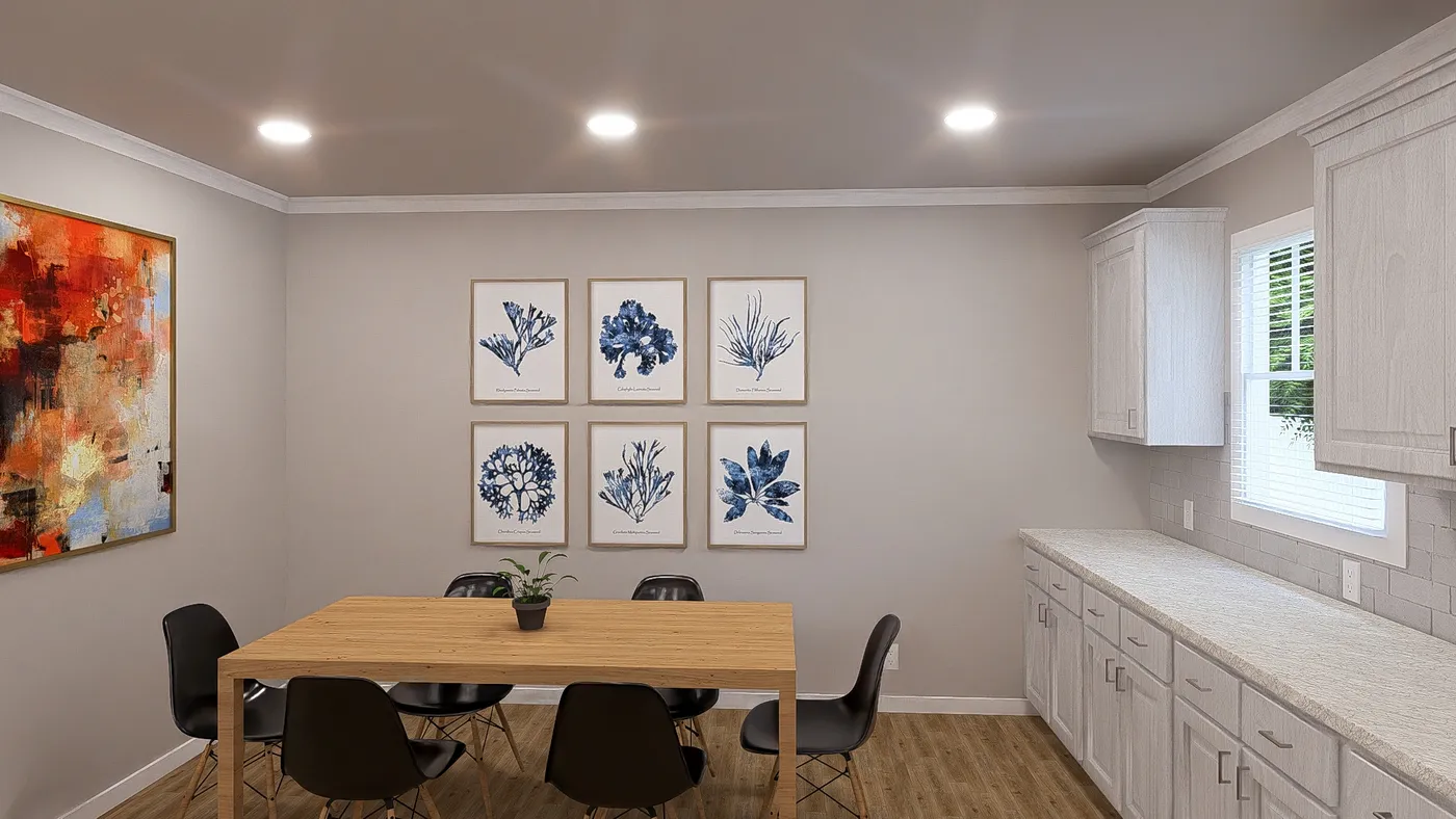 The THE HEXAGON Dining Area. This Manufactured Mobile Home features 4 bedrooms and 3 baths.