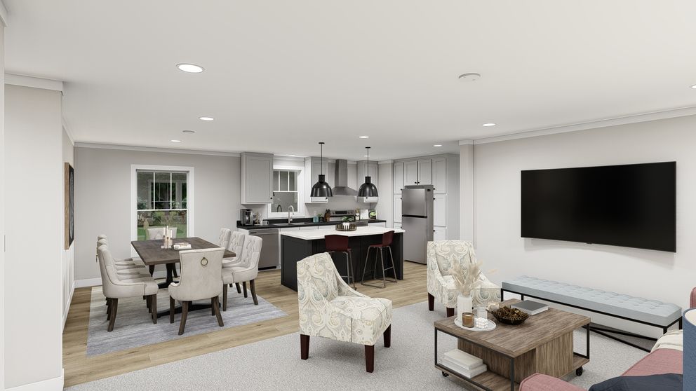 The LEAN ON ME Living Room. This Manufactured Mobile Home features 3 bedrooms and 2 baths.
