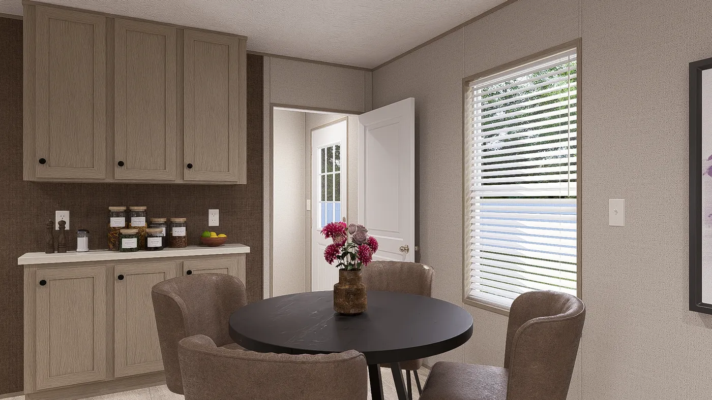 The BLAZER 66 B Dining Room. This Manufactured Mobile Home features 3 bedrooms and 2 baths.