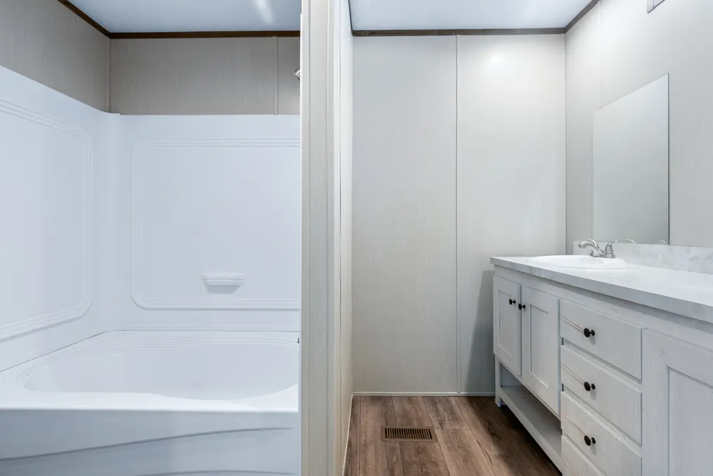 The SELECT 16722S Guest Bathroom. This Manufactured Mobile Home features 2 bedrooms and 2 baths.