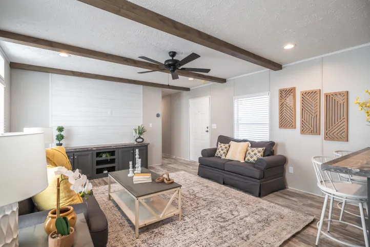 The ANNIVERSARY CHOICE Living Room. This Manufactured Mobile Home features 3 bedrooms and 2 baths.