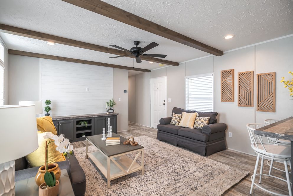 The ANNIVERSARY CHOICE Living Room. This Manufactured Mobile Home features 3 bedrooms and 2 baths.