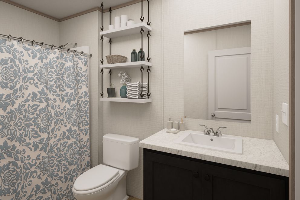 The ULTRA FLEX Guest Bathroom. This Manufactured Mobile Home features 4 bedrooms and 2 baths.