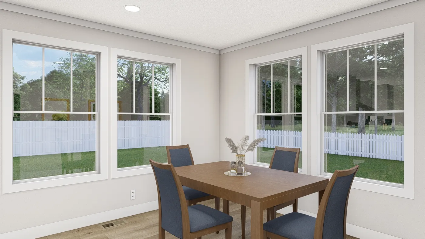 The WHOLE LOTTA LOVE Dining Room. This Manufactured Mobile Home features 3 bedrooms and 2 baths.