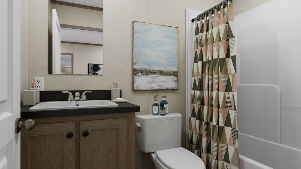 The 6614-CC02 CLEARPATH 66 Primary Bathroom. This Manufactured Mobile Home features 3 bedrooms and 2 baths.