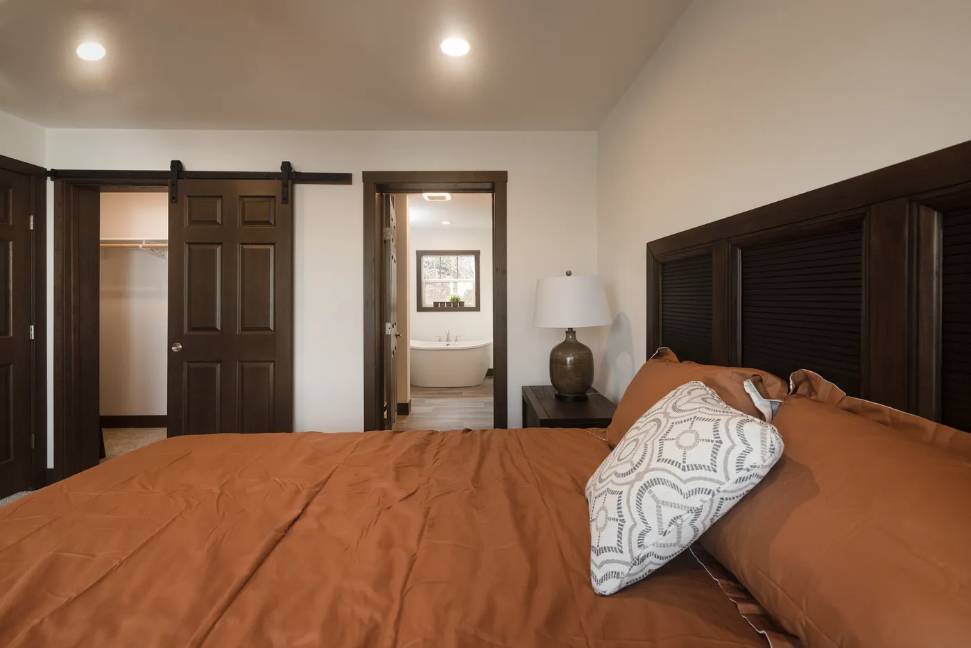 The LEGEND 78 Primary Bedroom. This Manufactured Mobile Home features 3 bedrooms and 2 baths.