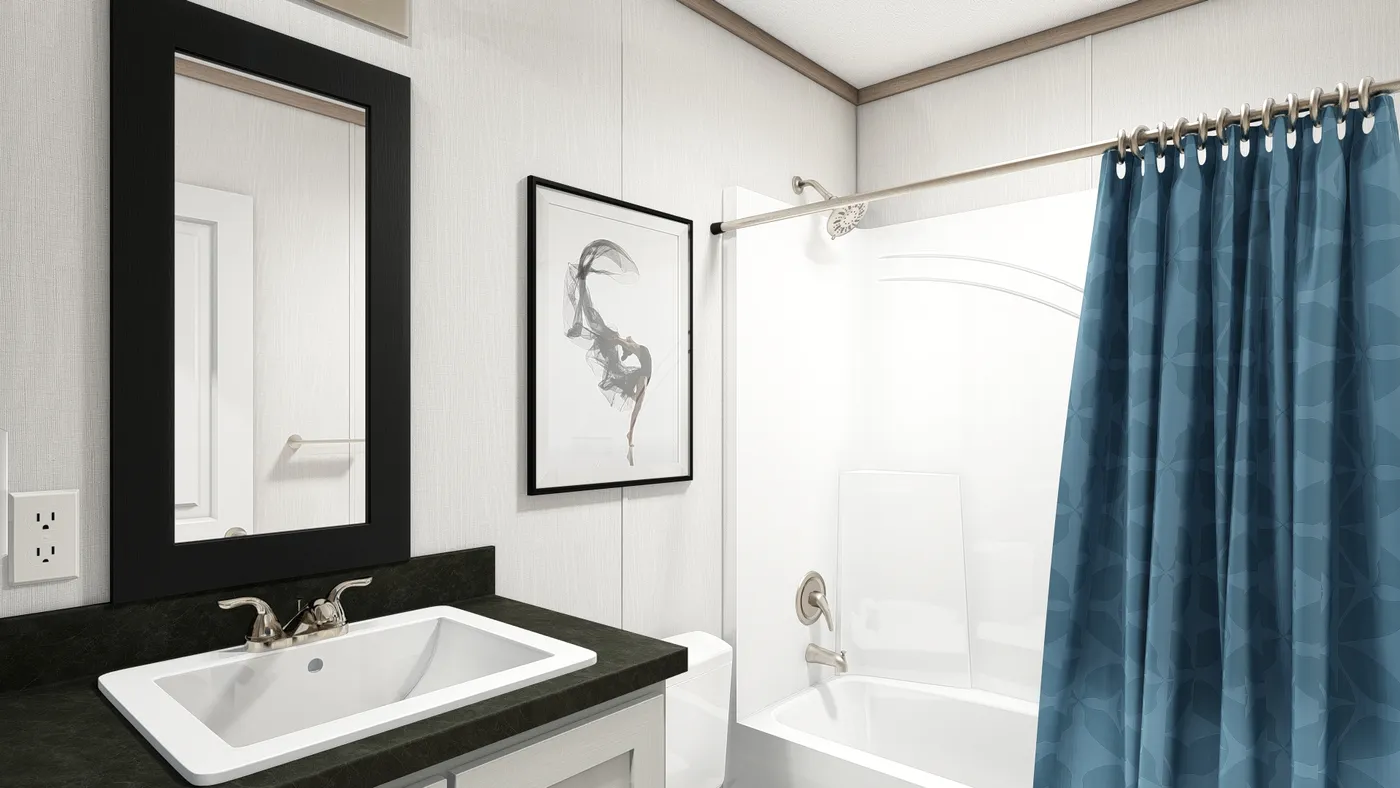 The 7616-4714 THE PULSE Guest Bathroom. This Manufactured Mobile Home features 3 bedrooms and 2 baths.