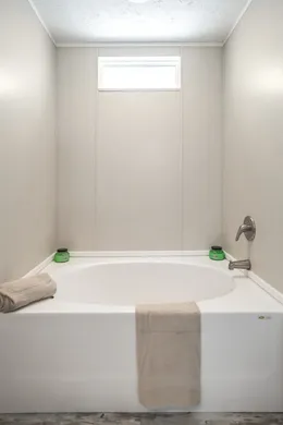 The BENJAMIN Primary Bathroom. This Manufactured Mobile Home features 3 bedrooms and 2 baths.