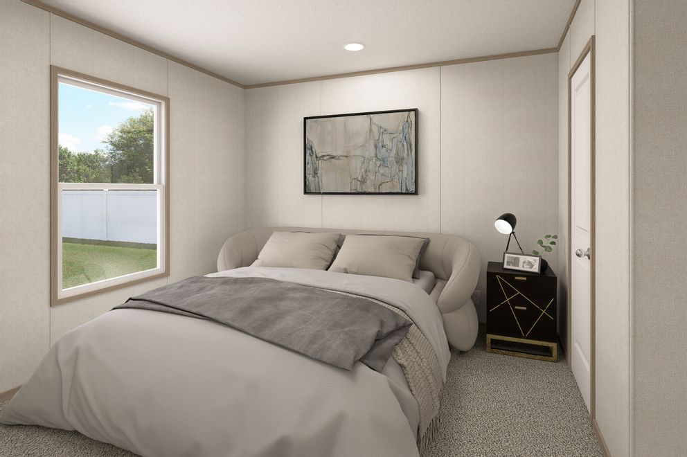 The THE EAGLE 76 Guest Bedroom. This Manufactured Mobile Home features 5 bedrooms and 2 baths.