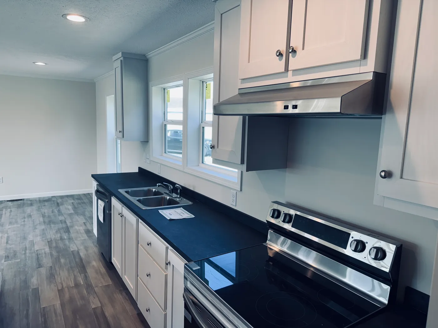 The TOURMALINE 7628-649 Kitchen. This Manufactured Mobile Home features 4 bedrooms and 2 baths.