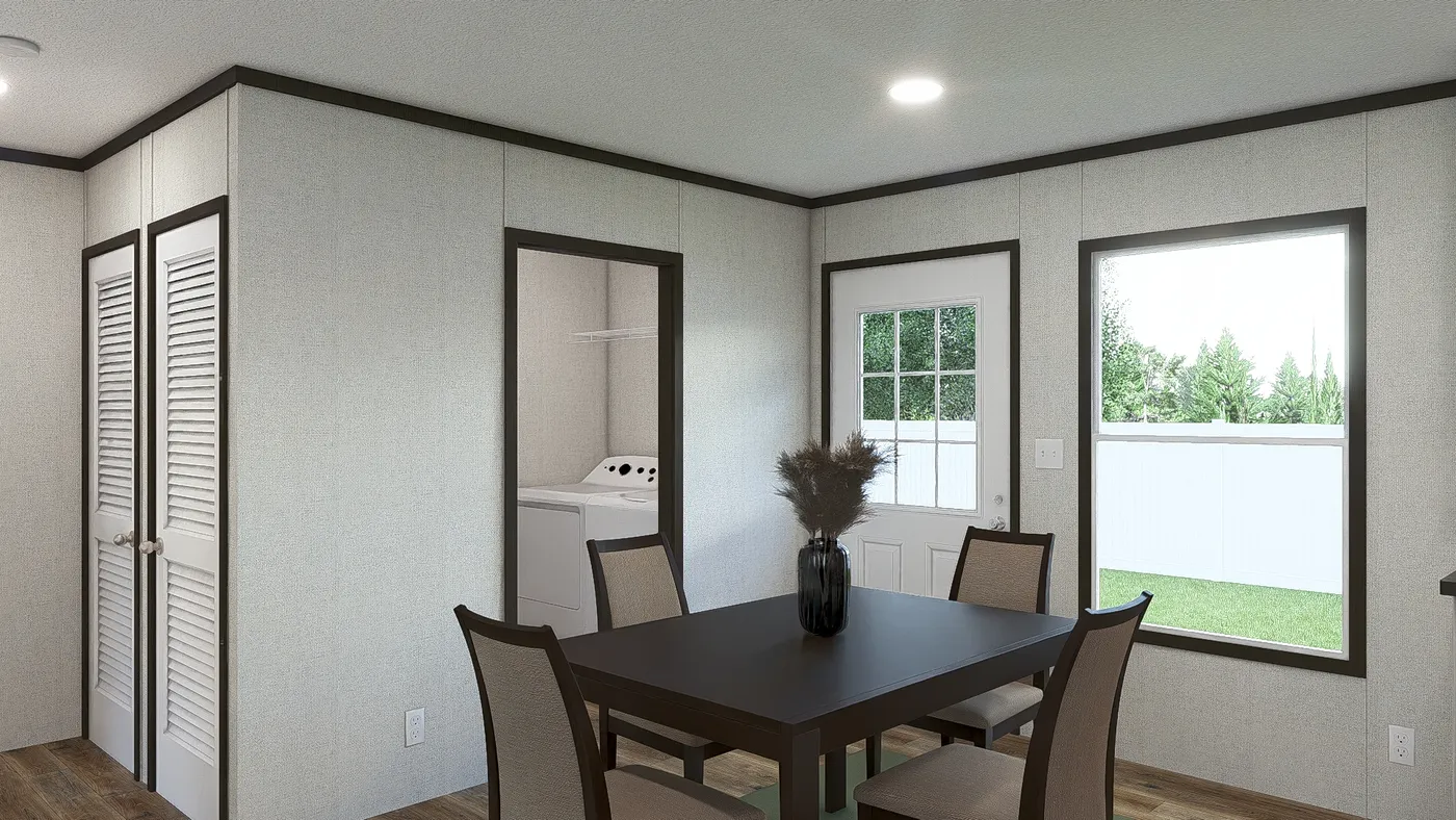 The GLIMPSE Dining Area. This Manufactured Mobile Home features 3 bedrooms and 2 baths.