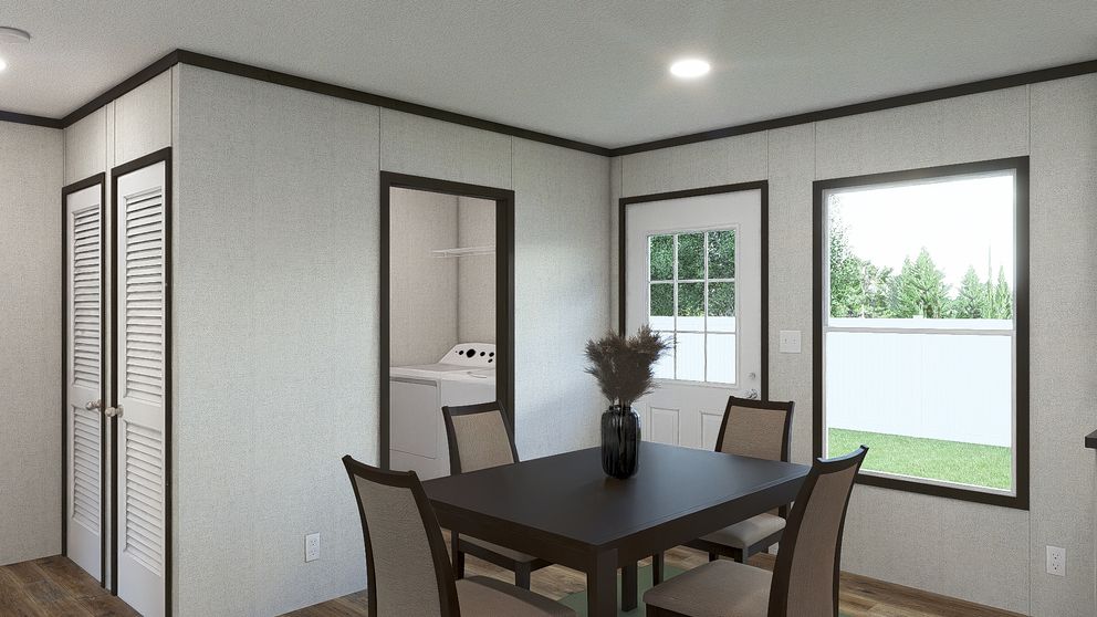 The GLIMPSE Dining Area. This Manufactured Mobile Home features 3 bedrooms and 2 baths.