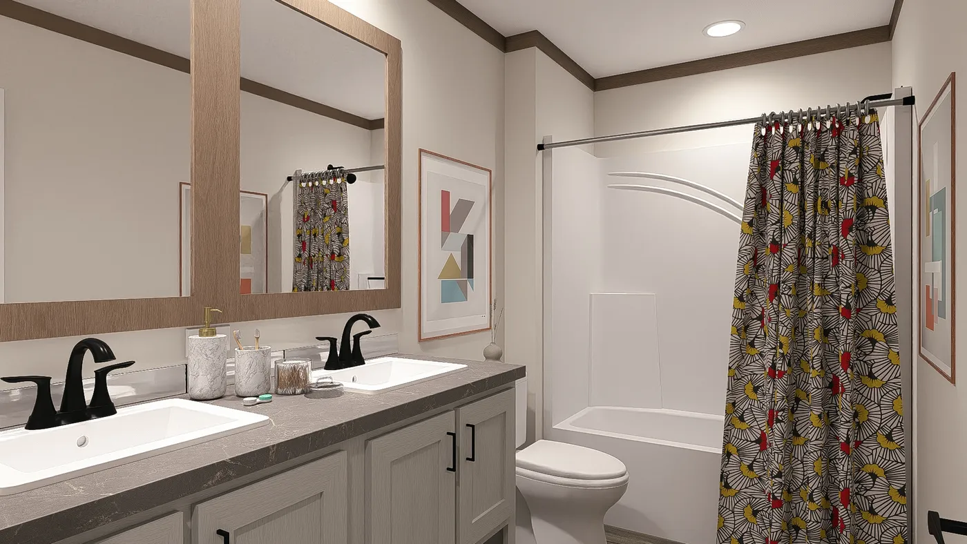 The SAWYER ELITE Guest Bathroom. This Manufactured Mobile Home features 3 bedrooms and 2 baths.