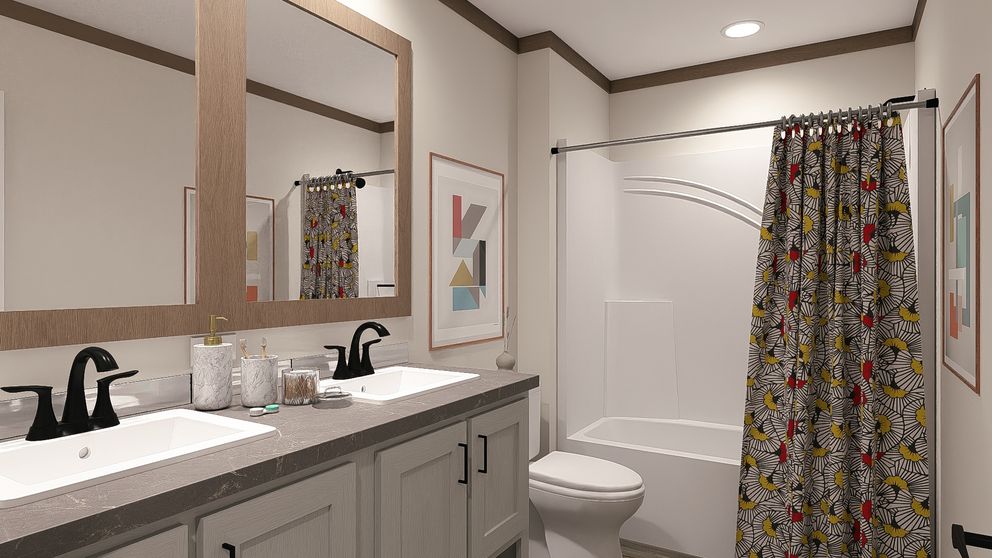 The SAWYER ELITE Guest Bathroom. This Manufactured Mobile Home features 3 bedrooms and 2 baths.