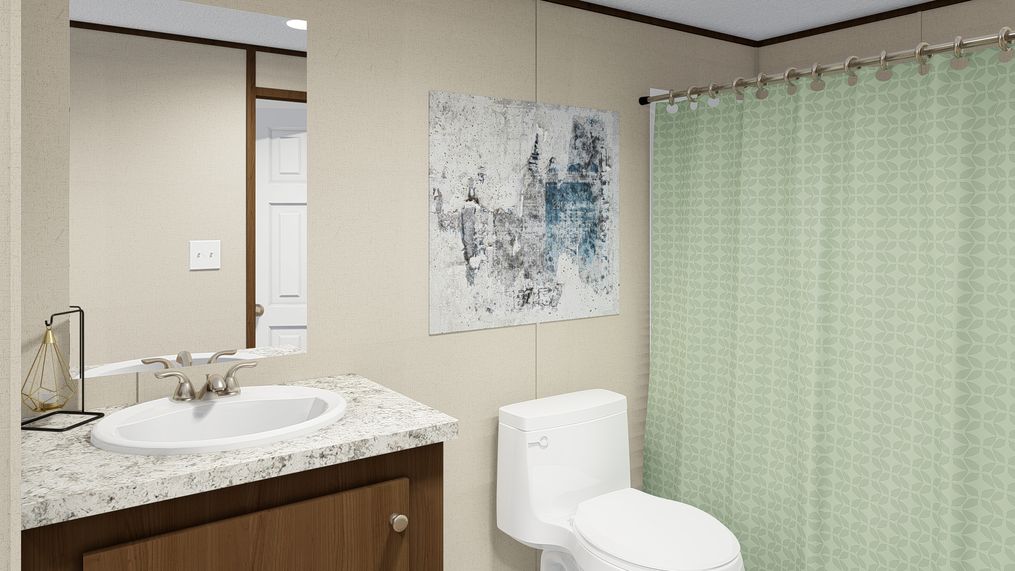 The GLORY Guest Bathroom. This Manufactured Mobile Home features 3 bedrooms and 2 baths.