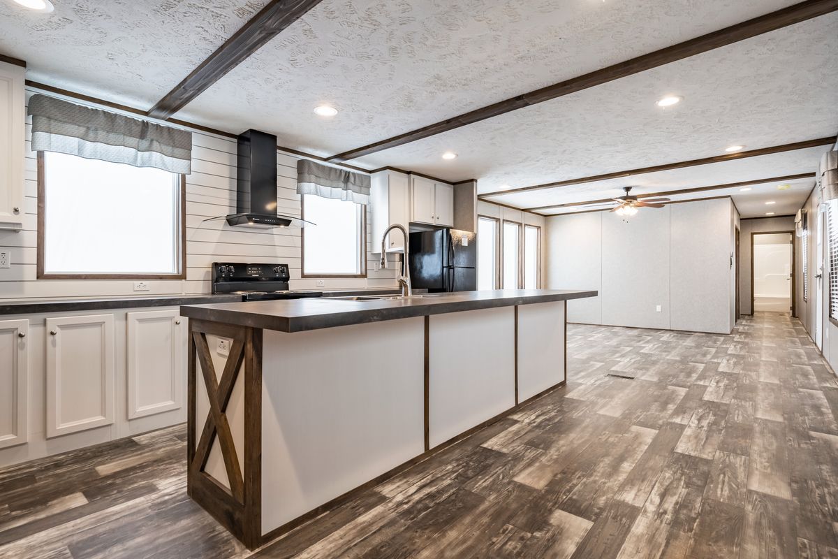The MAJOR Exterior. This Manufactured Mobile Home features 3 bedrooms and 2 baths.
