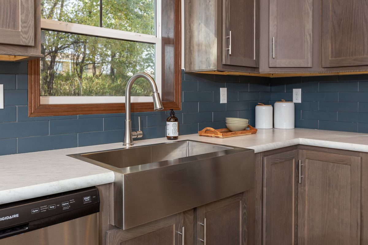 The LEGEND 86 Kitchen. This Manufactured Mobile Home features 3 bedrooms and 2 baths.