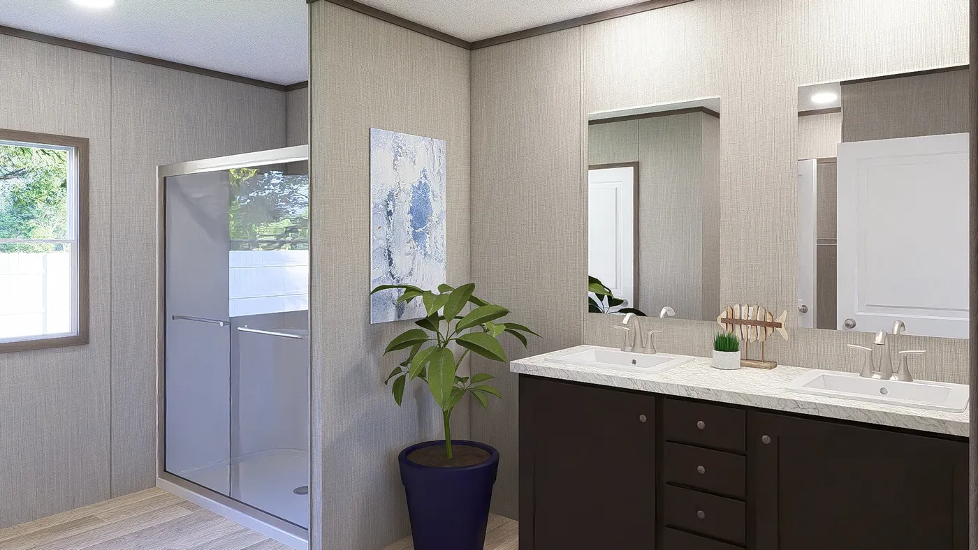 The ULTRA BREEZE 28X76 Primary Bathroom. This Manufactured Mobile Home features 4 bedrooms and 2 baths.