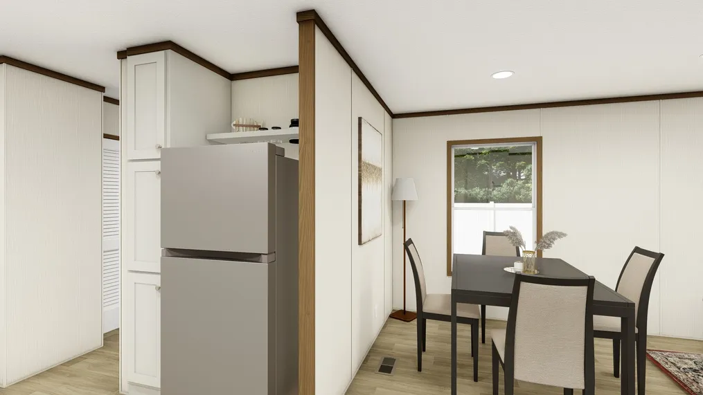 The THE DESIRE Dining Area. This Manufactured Mobile Home features 3 bedrooms and 2 baths.