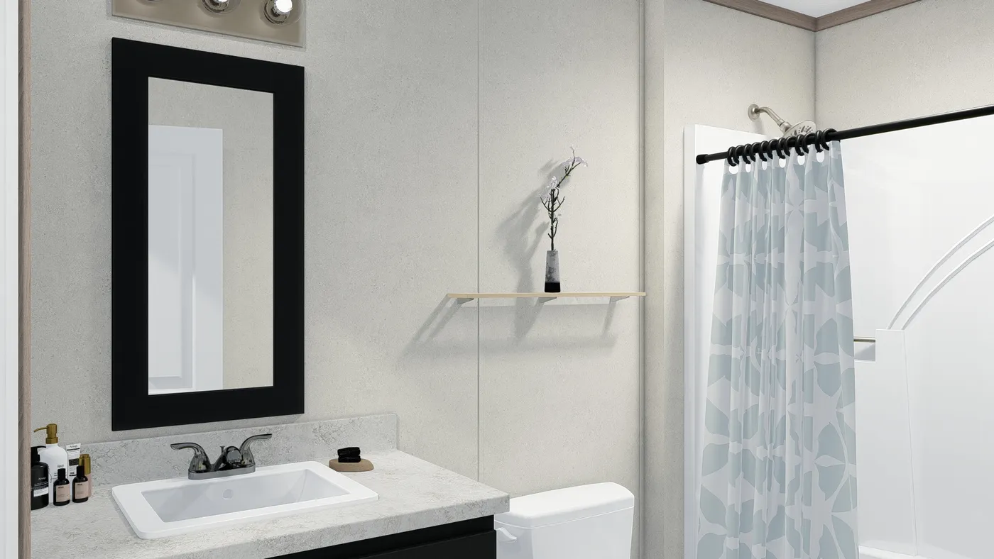 The 7228-5789 THE PULSE Guest Bathroom. This Manufactured Mobile Home features 3 bedrooms and 2 baths.