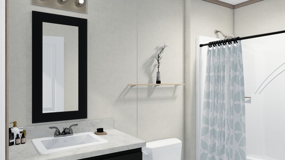 The 7228-5789 THE PULSE Guest Bathroom. This Manufactured Mobile Home features 3 bedrooms and 2 baths.