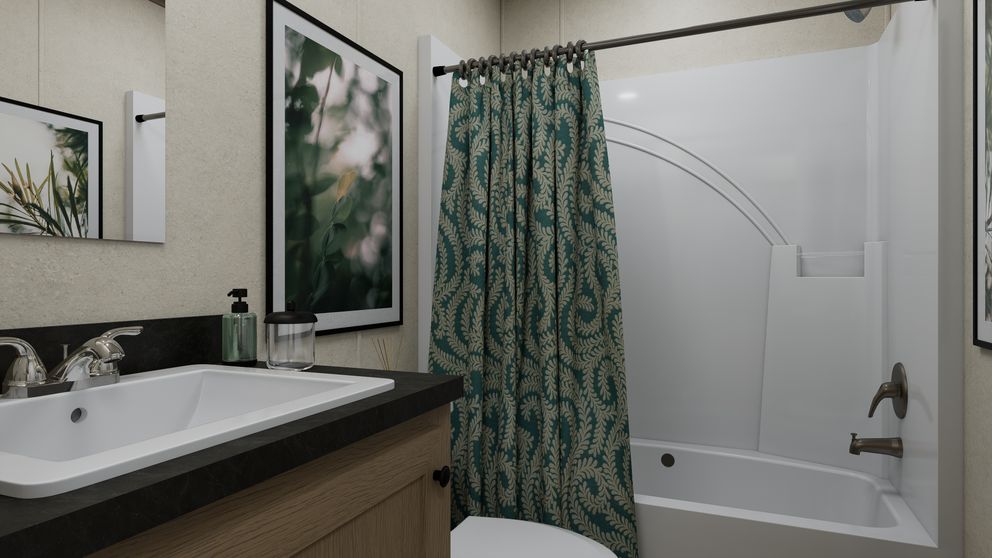 The 6016-CC03 HARBORVIEW 60 Guest Bathroom. This Manufactured Mobile Home features 2 bedrooms and 2 baths.
