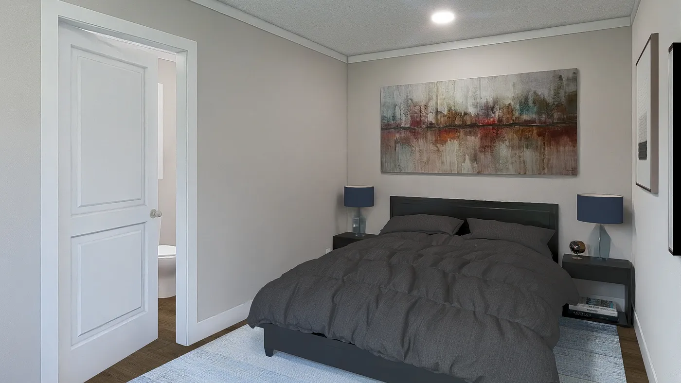 The STILL THE ONE Primary Bedroom. This Manufactured Mobile Home features 2 bedrooms and 2 baths.