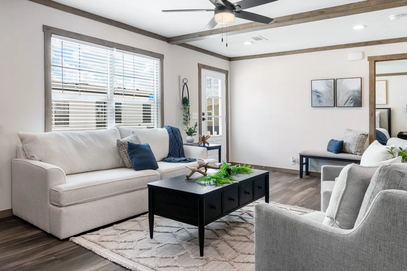 The FARM 4 FLEX Living Room. This Manufactured Mobile Home features 4 bedrooms and 3 baths.