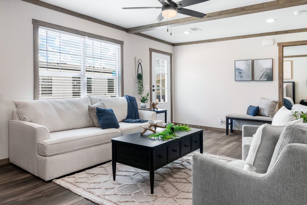 The FARM 4 FLEX Living Room. This Manufactured Mobile Home features 4 bedrooms and 3 baths.