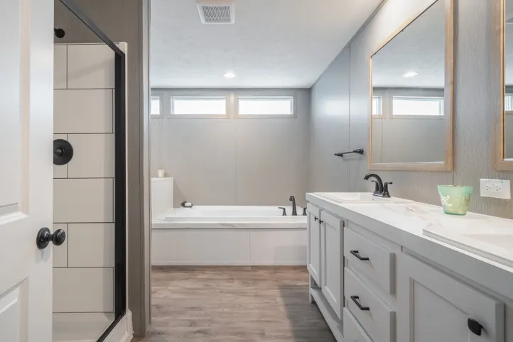 The BLUEBONNET BREEZE Primary Bathroom. This Manufactured Mobile Home features 3 bedrooms and 2 baths.