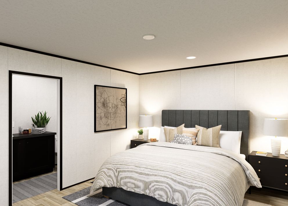 The LUMEN Primary Bedroom. This Manufactured Mobile Home features 3 bedrooms and 2 baths.