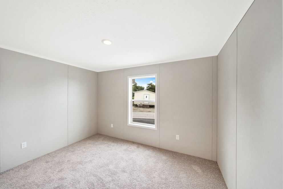 The RUBY Guest Bedroom. This Manufactured Mobile Home features 2 bedrooms and 2 baths.