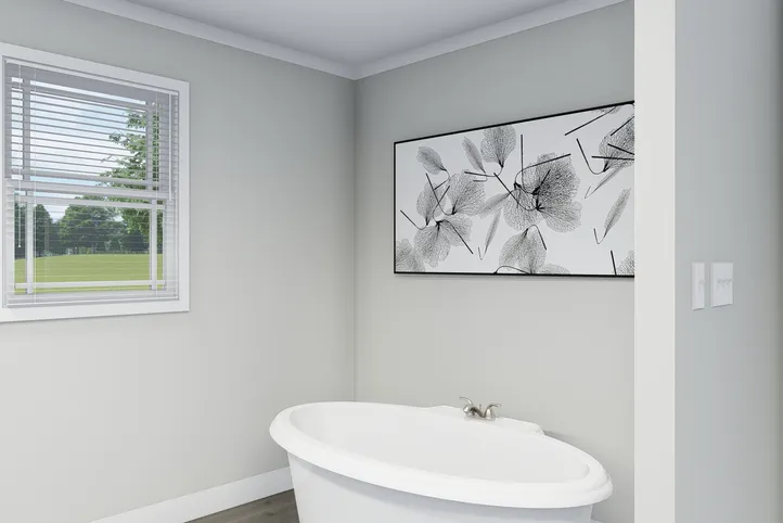 The THE BREEZE Primary Bathroom. This Manufactured Mobile Home features 3 bedrooms and 2 baths.