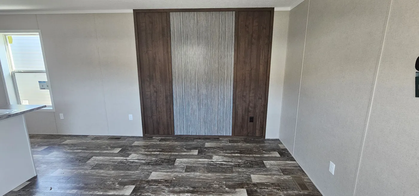 The ONYX 48 Living Room. This Manufactured Mobile Home features 2 bedrooms and 1 bath.