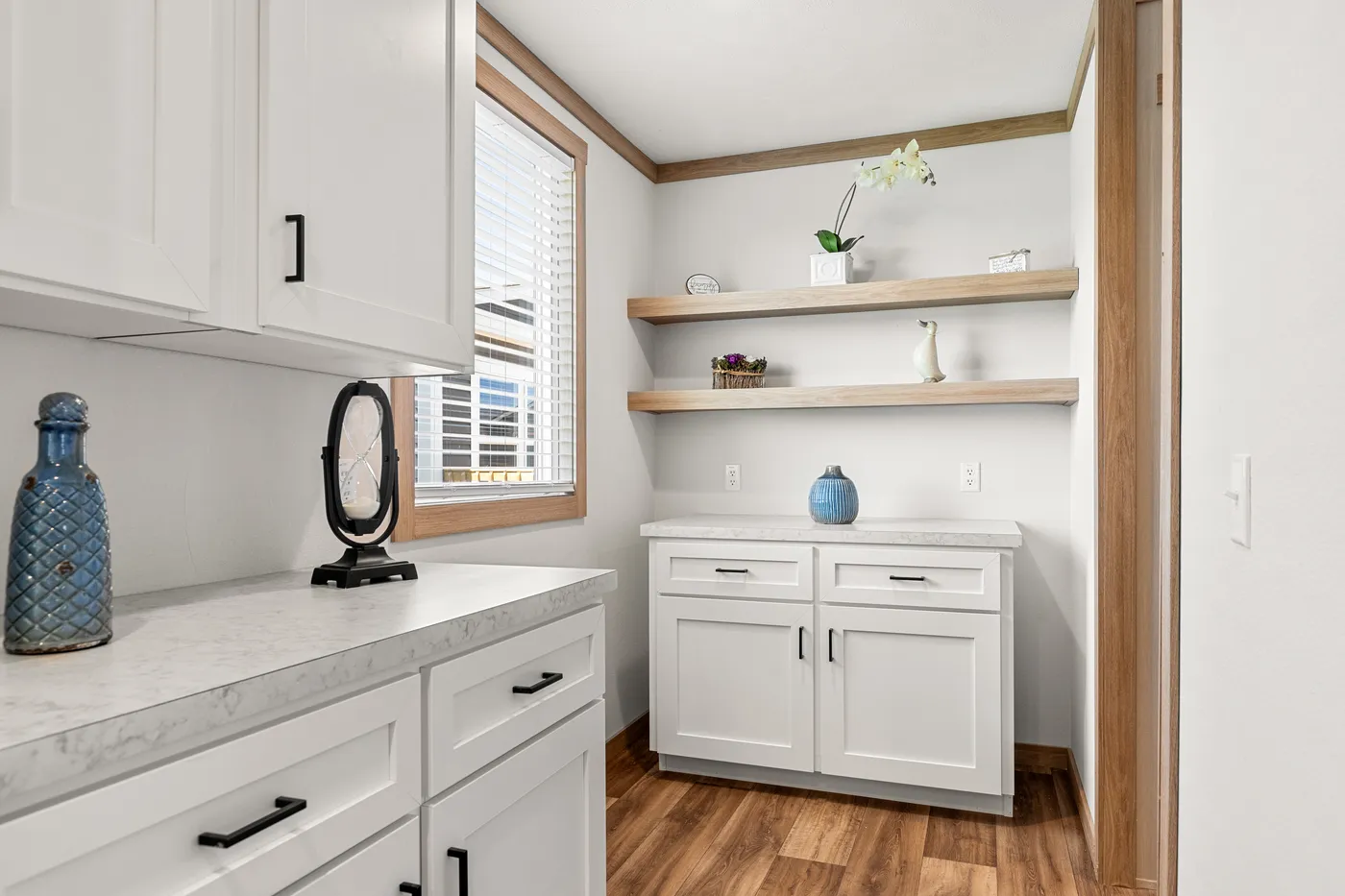 The LIZZIE Kitchen. This Manufactured Mobile Home features 3 bedrooms and 2 baths.