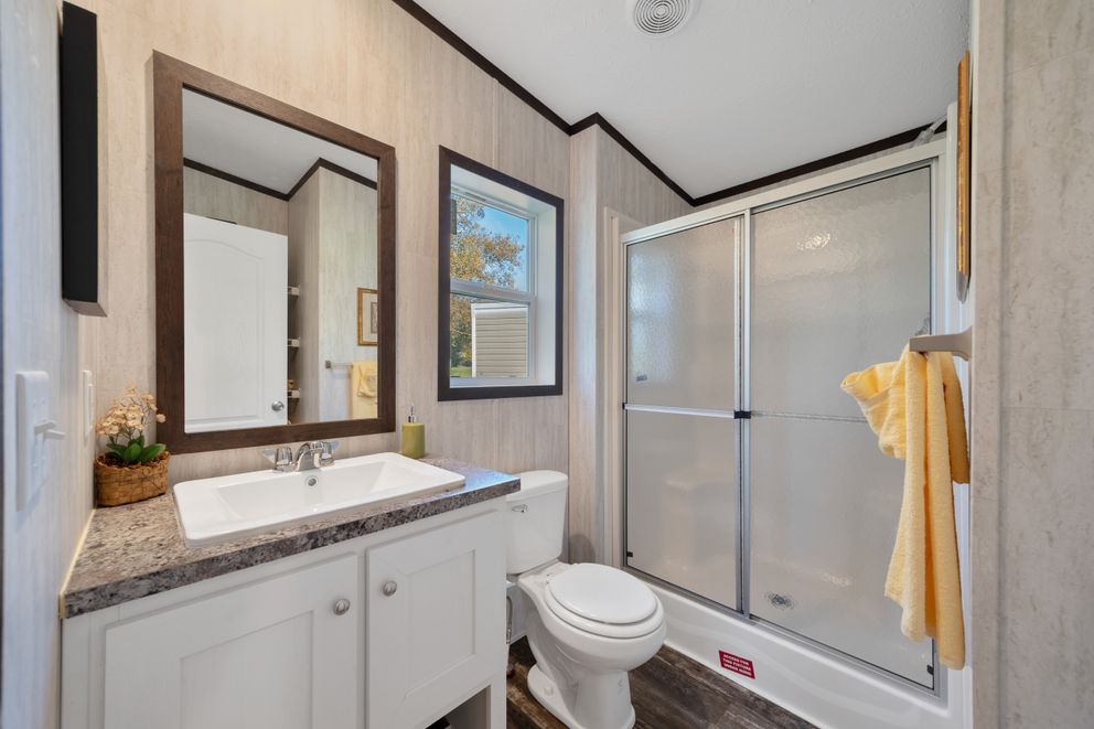 The GARNET Primary Bathroom. This Manufactured Mobile Home features 3 bedrooms and 2 baths.