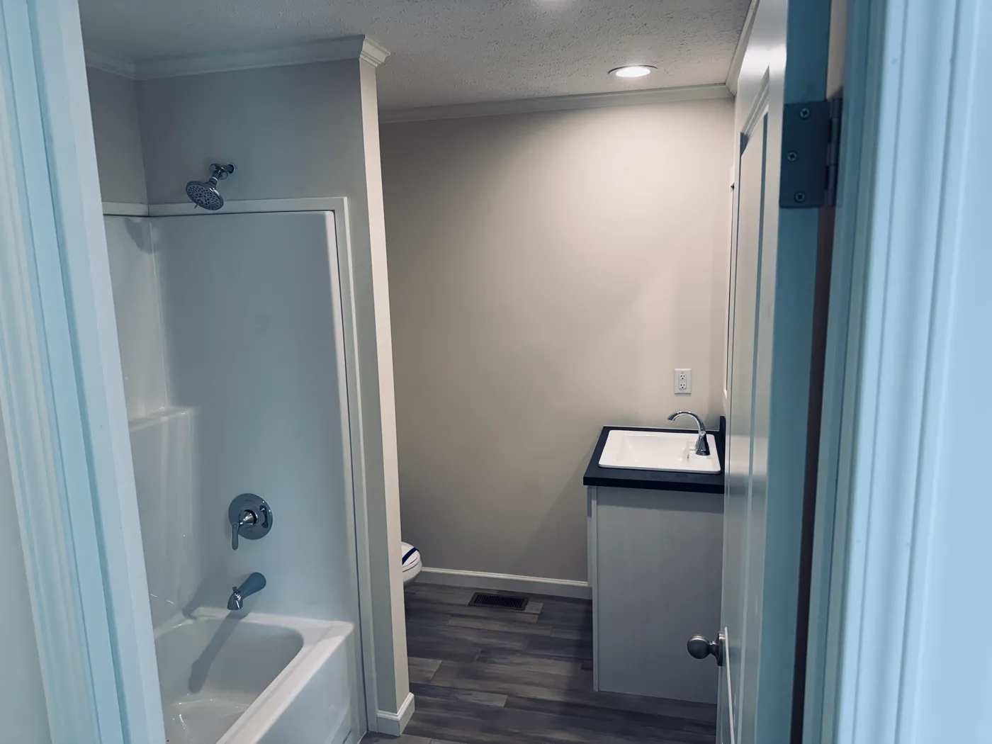 The TOURMALINE 7628-649 Guest Bathroom. This Manufactured Mobile Home features 4 bedrooms and 2 baths.
