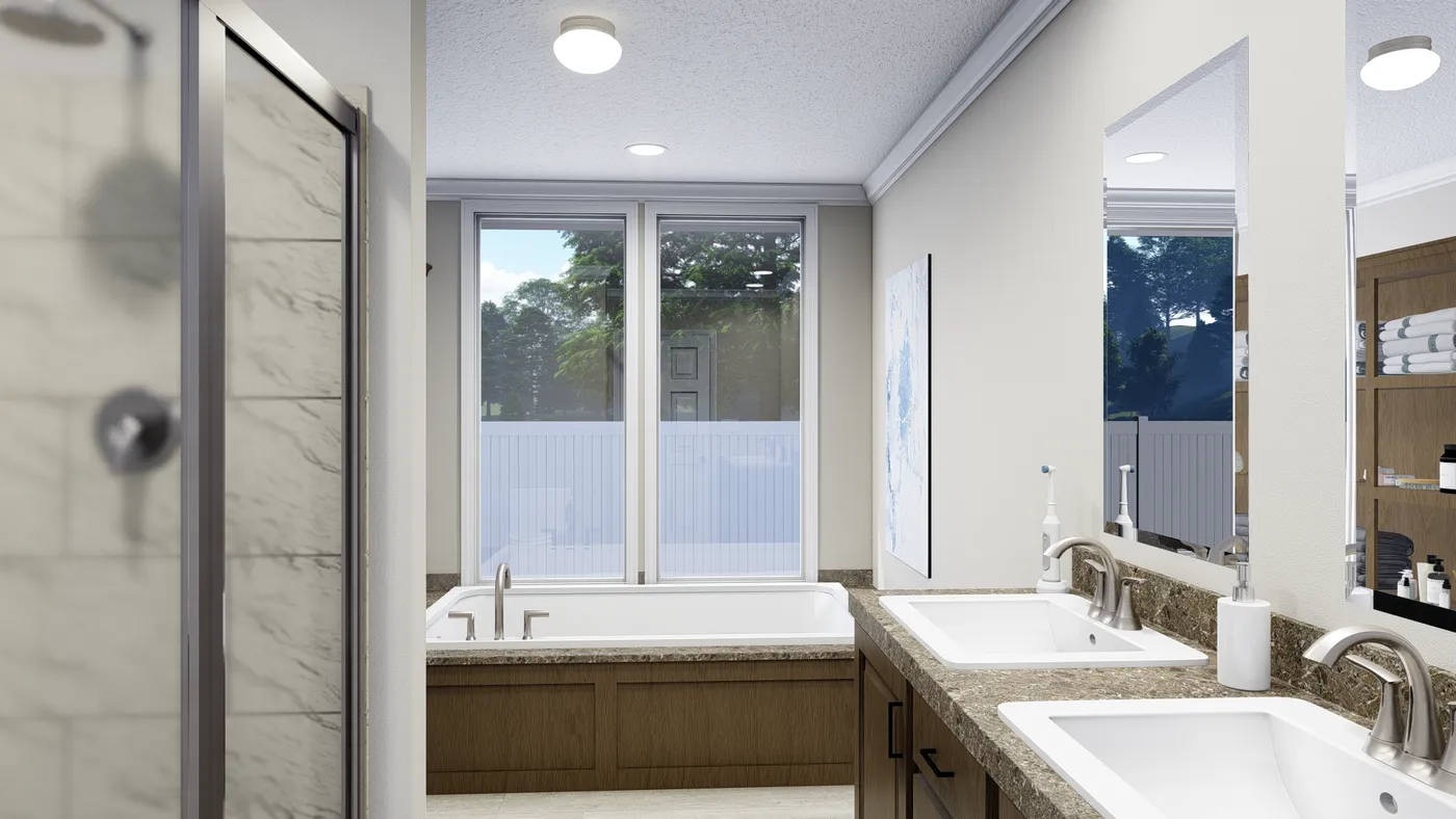 The PINEHURST 3104 Primary Bathroom. This Manufactured Mobile Home features 3 bedrooms and 2 baths.