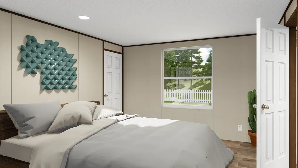 The SENSATION Primary Bedroom. This Manufactured Mobile Home features 3 bedrooms and 2 baths.