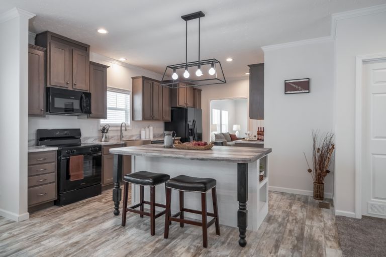 The 4872 ENTERPRISE 32X76 HUD Kitchen. This Manufactured Mobile Home features 4 bedrooms and 2 baths.