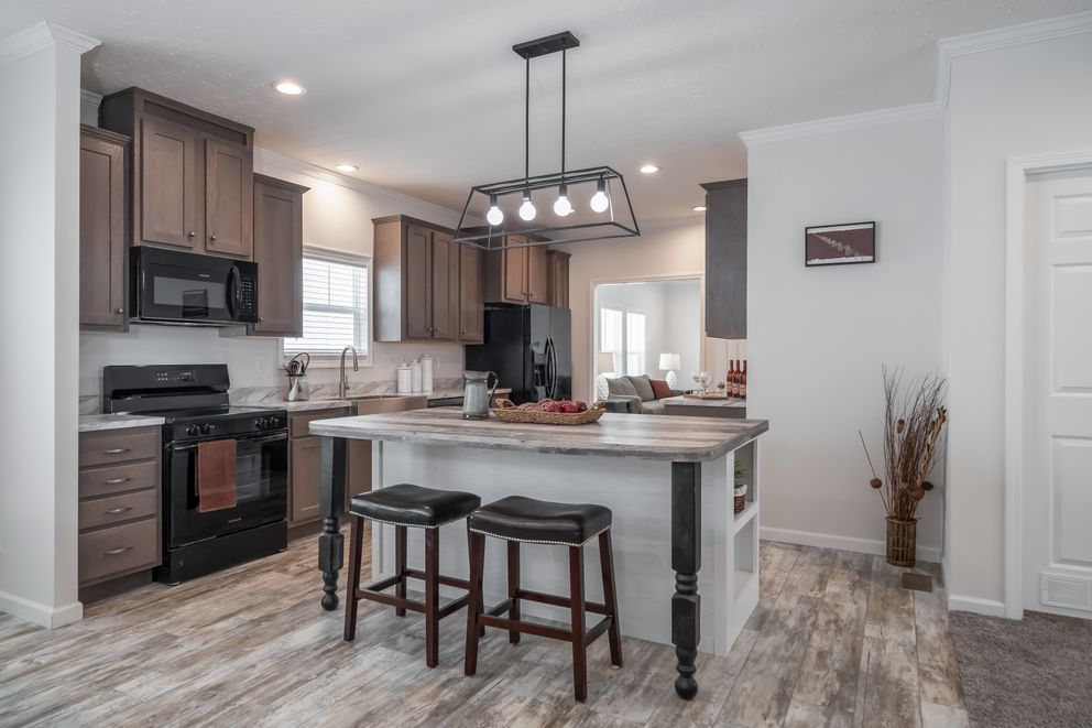 The 4872 ENTERPRISE 32X76 HUD Kitchen. This Manufactured Mobile Home features 4 bedrooms and 2 baths.