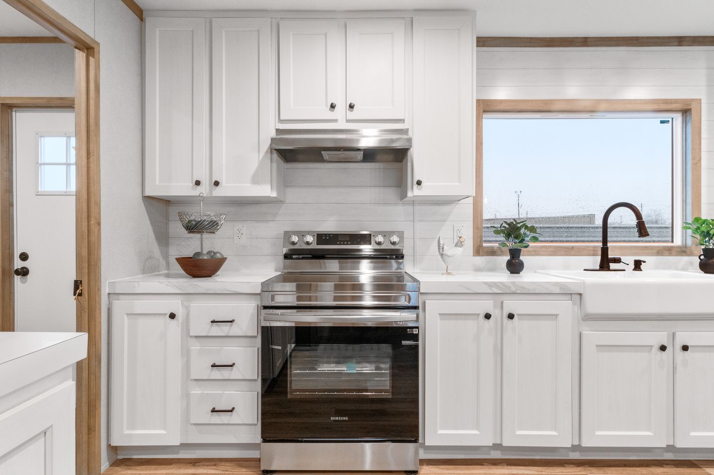 The THE CHOICE Kitchen. This Manufactured Mobile Home features 4 bedrooms and 2 baths.