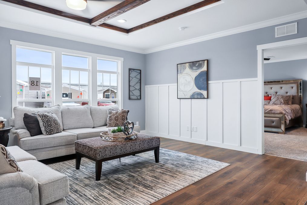 The THE ATLAS Living Room. This Manufactured Mobile Home features 4 bedrooms and 3 baths.