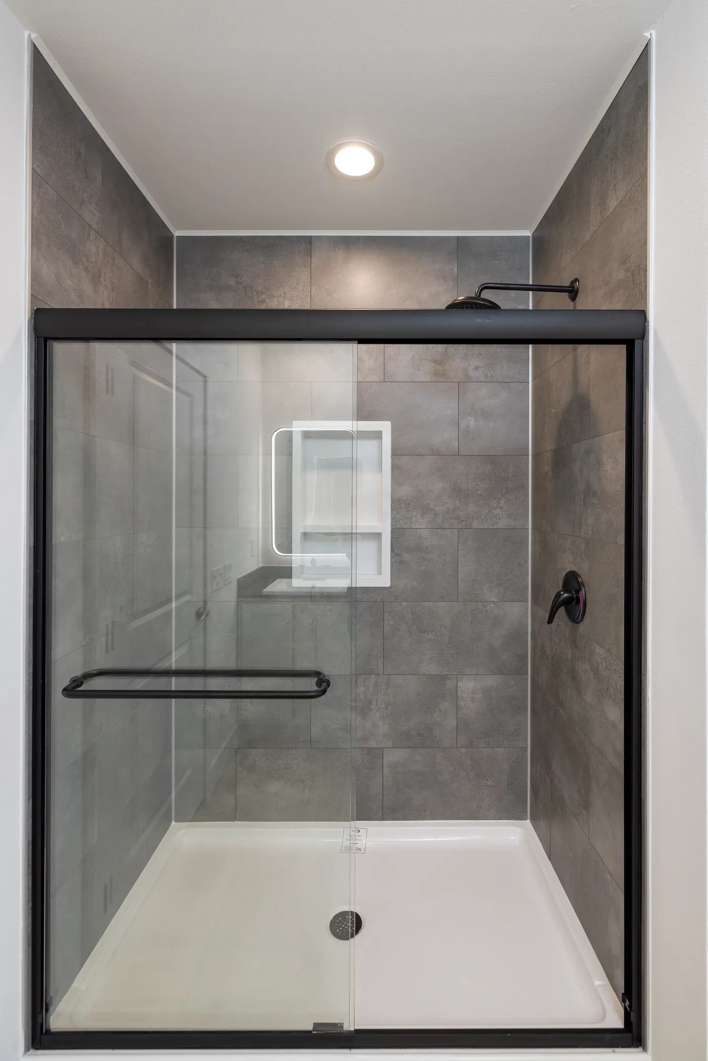 The WINSTON Primary Bathroom. This Manufactured Mobile Home features 3 bedrooms and 2 baths.