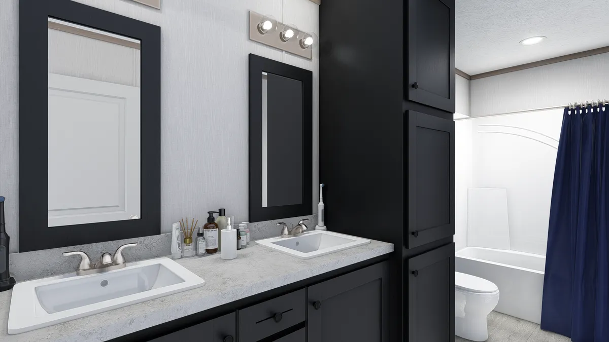 The 4828-E782 THE PULSE Primary Bathroom. This Manufactured Mobile Home features 3 bedrooms and 2 baths.