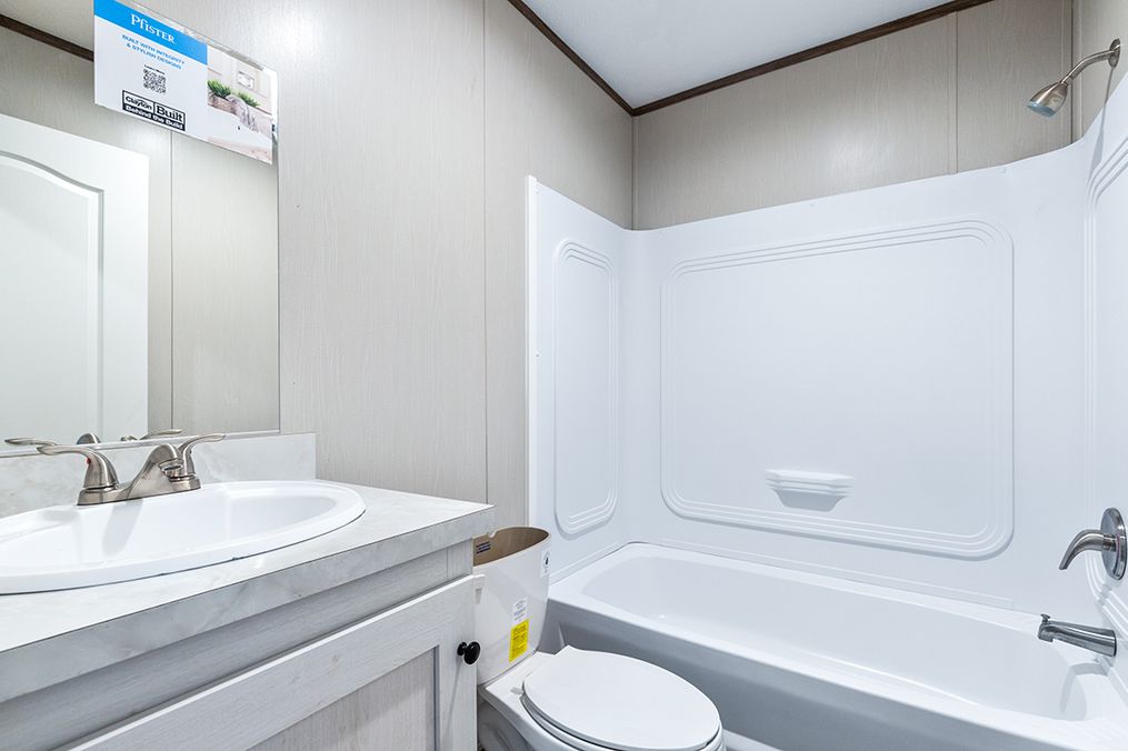 The SELECT 16723B Guest Bathroom. This Manufactured Mobile Home features 3 bedrooms and 2 baths.
