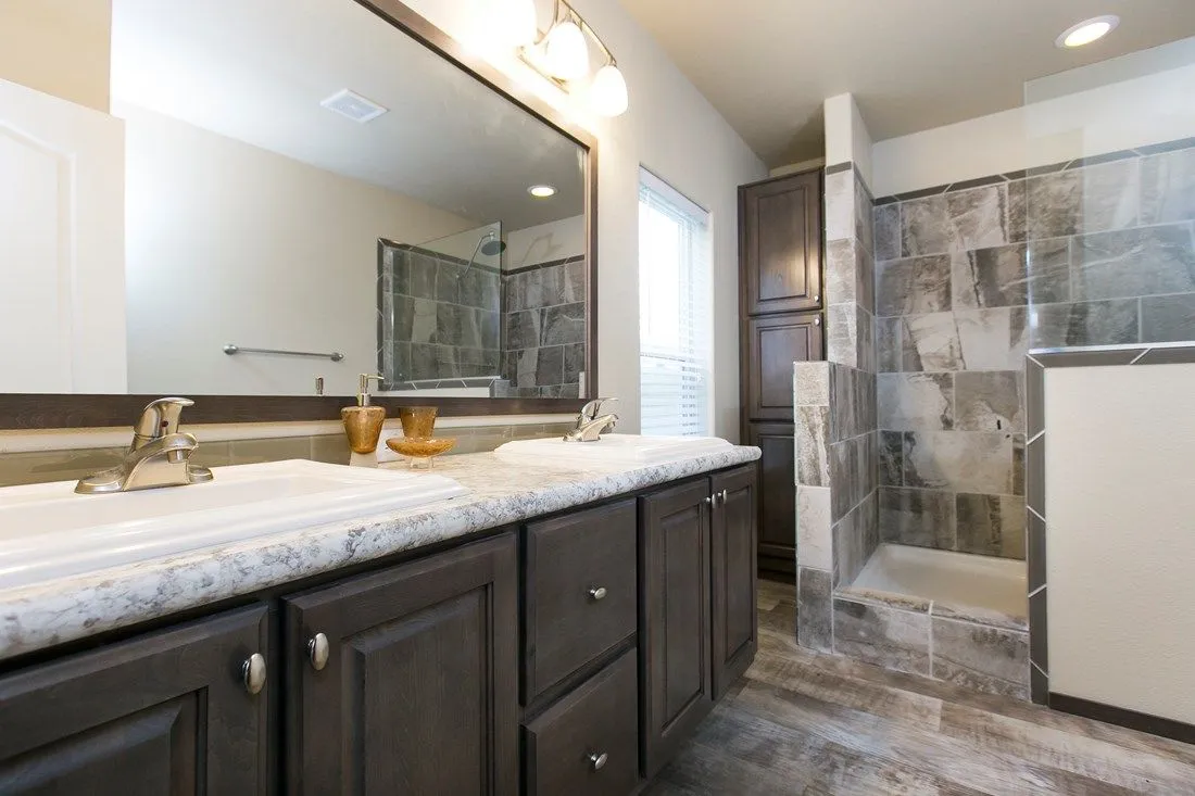 The 2023 COLUMBIA RIVER (NEW) Primary Bathroom. This Manufactured Mobile Home features 3 bedrooms and 2 baths.