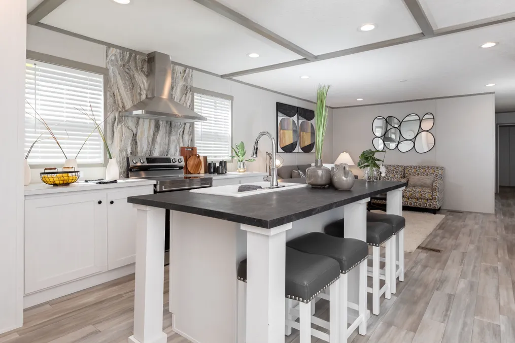 The ANNIVERSARY JEWEL Kitchen. This Manufactured Mobile Home features 3 bedrooms and 2 baths.